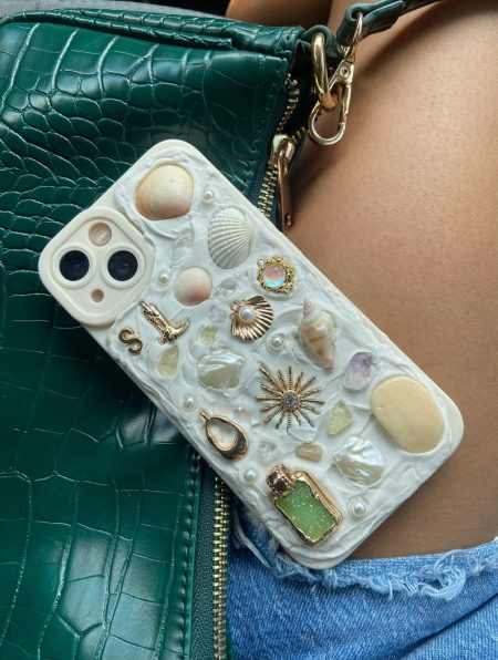 Handcrafted Memor inspired iPhone Case. Each case is unique. Made with hand picked Sanibel shells, authentic crystals, and charms.